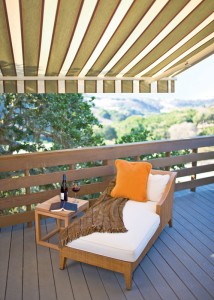 Sunbrella Fabricated Retractable Awning covering a deck, creating a relaxing atmosphere.