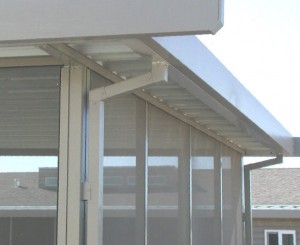 Simple Standing Seam Awnings finished with gutters and downspouts